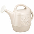 Regadera de jardín 9L color crema con diseño floral en relieve